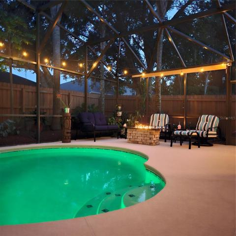 Firepit lit with pool light color blue.  It also has so many other colors to choose from.