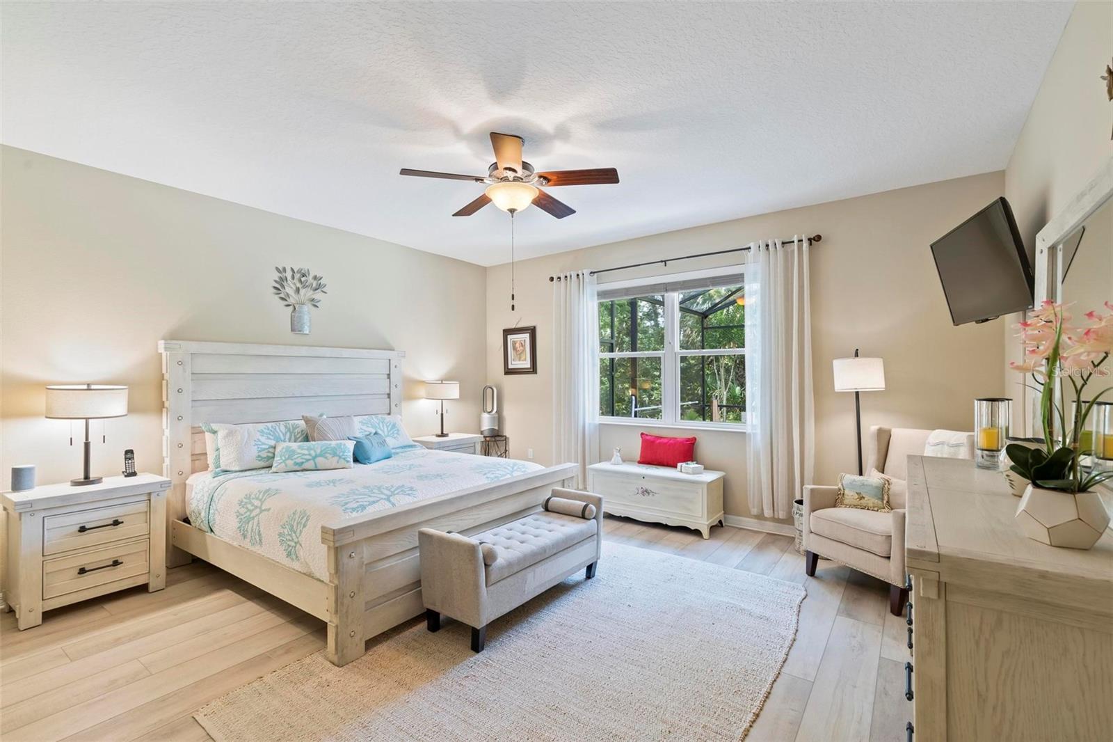 Master bedroom with bright window