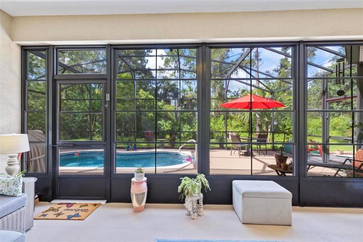 View from inside home to pool