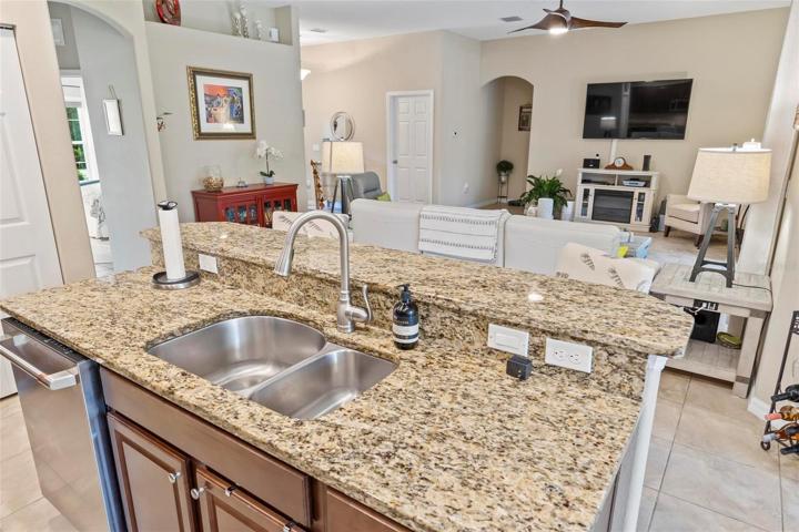 Kitchen with granite and adjoining family room
