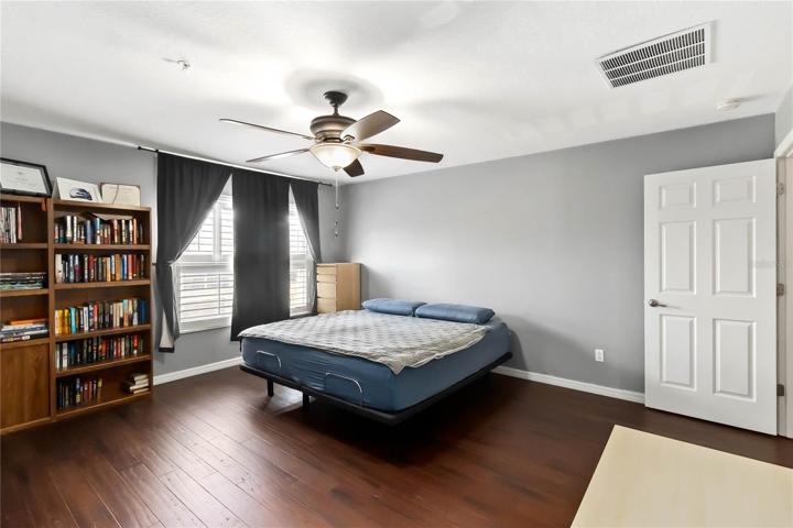 Bright sunlight glistens in to this open casual space.