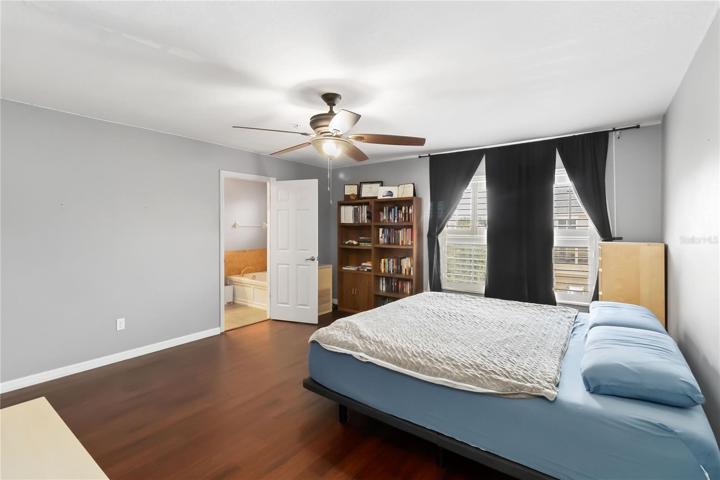 Spacious owner's suite offers spacious walk-in closet, en suite bath with garden tub.