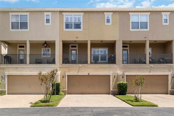 This townhome has a two-car garage with two storage areas for private parking