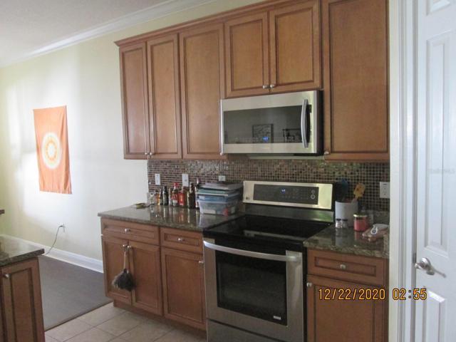 Looking into the kitchen from the dining area.