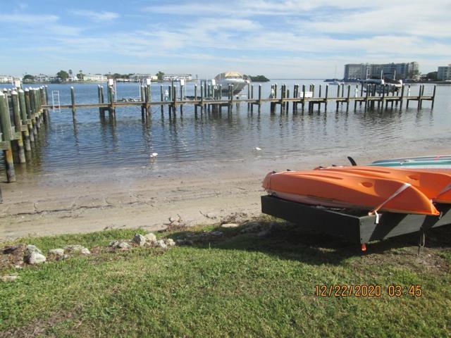 Waterfront w/personal watercraft storage area and deeded docks.