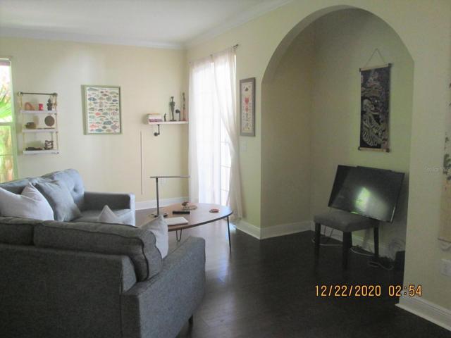 Living area with French doors out to yard area.
