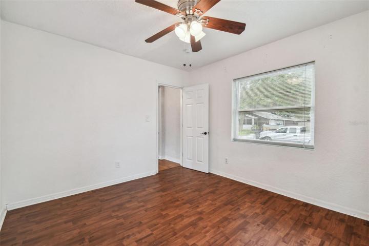 Bedroom 1 offers a street view