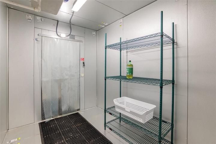 Commercial refrigerator in retro-fitted metal container