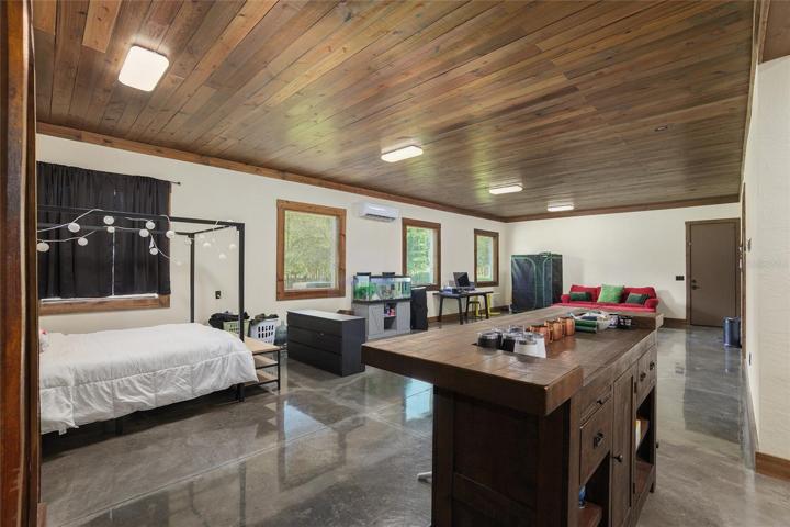 Guest office behind garage with kitchen/wet bar
