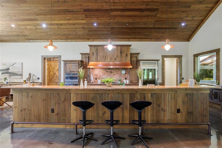 Bar seating area by kitchen island