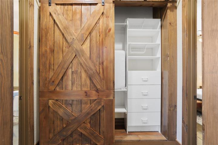 Hallway closet with barn doors