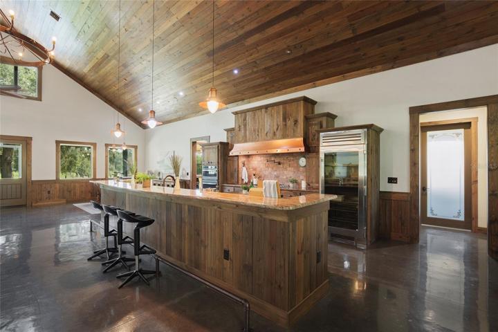 Large granite island in kitchen. Perfect for guests!
