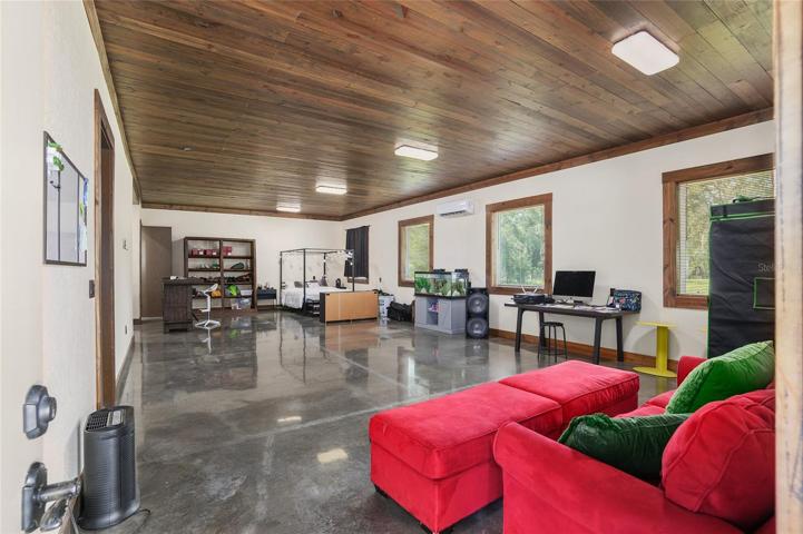Guest office behind 3-car garage with kitchen/wet bar