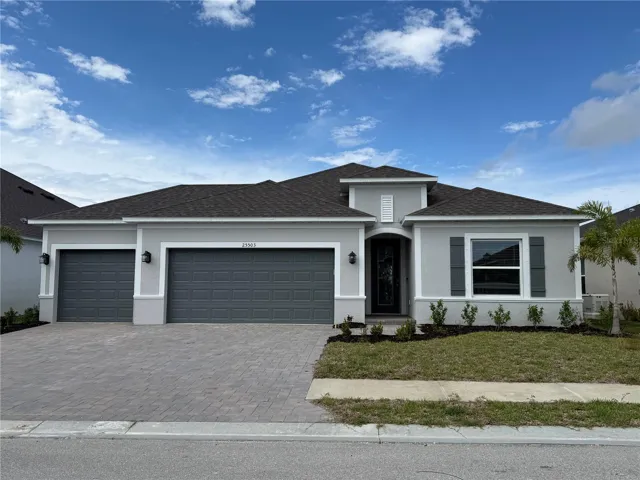 Stunning Exterior - Block construction, 3 Car Garage, Brick Pavers