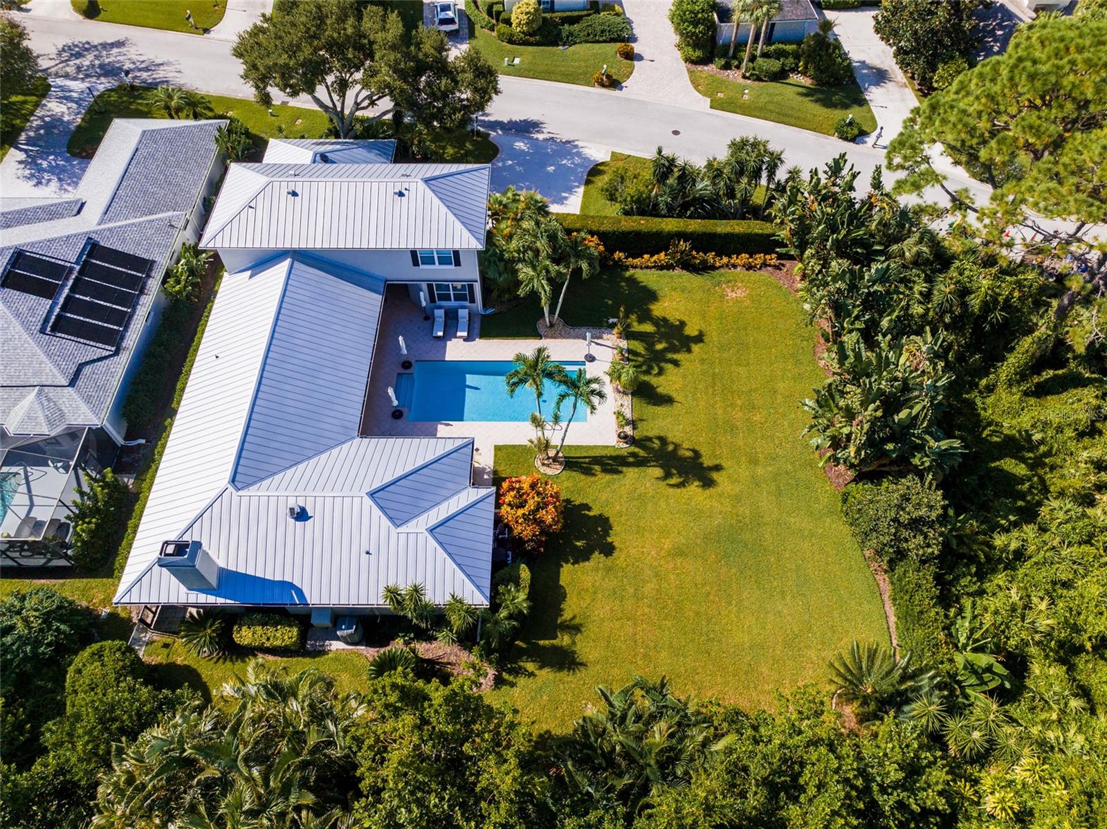 Aerial View of Home & property showing back yard