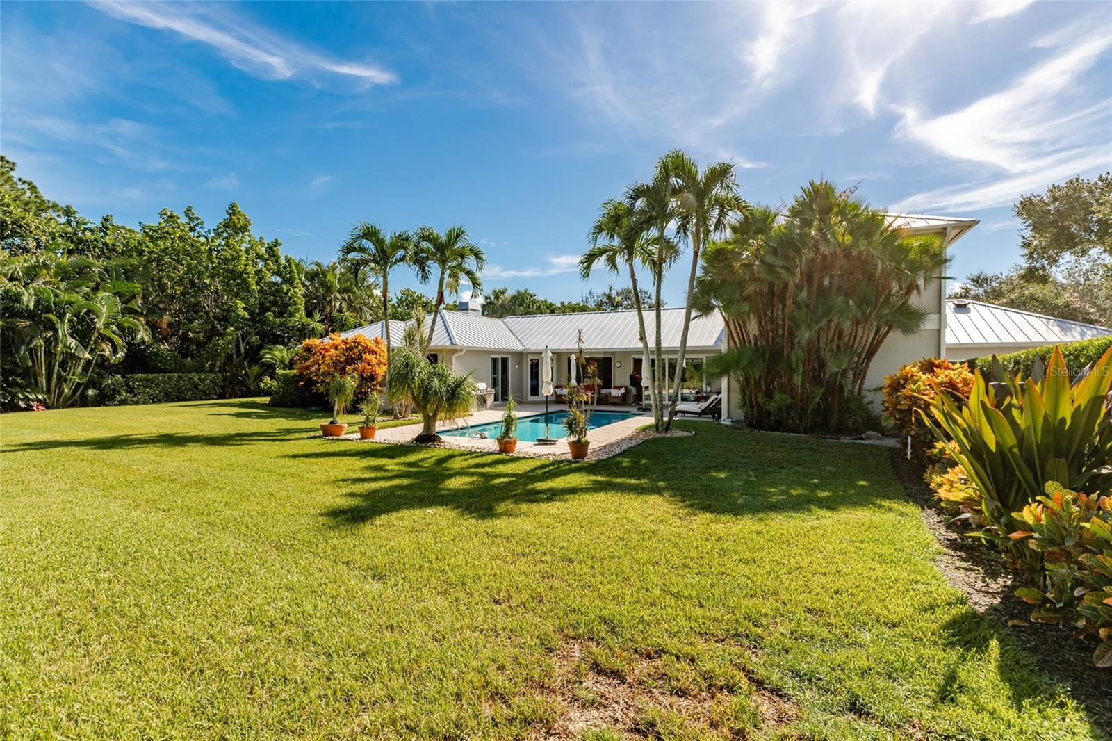 Back yard to pool and back of house