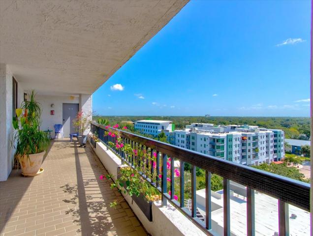 Large back porch balcony looking over downtown Orlando and Lake Eola.