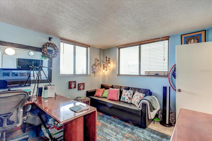 Newly renovated Bedroom #1 used as office. Boasting designer wallpaper, painting and design.