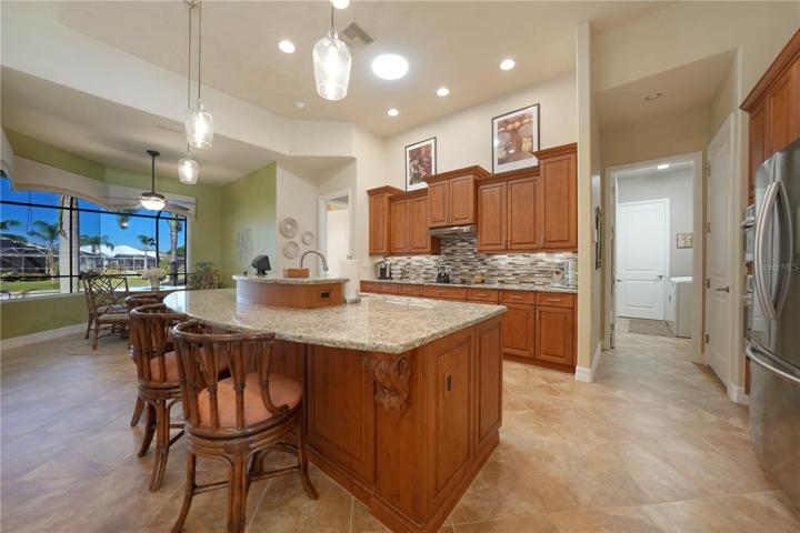 Kitchen with S/S Appliances, Granite Countertops, Wood Cabinets with soft close feature