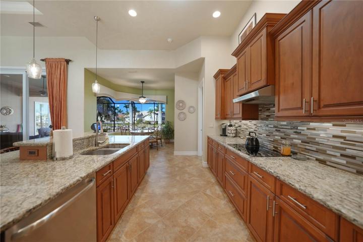 Kitchen with S/S Appliances, Granite Countertops, Wood Cabinets with soft close feature