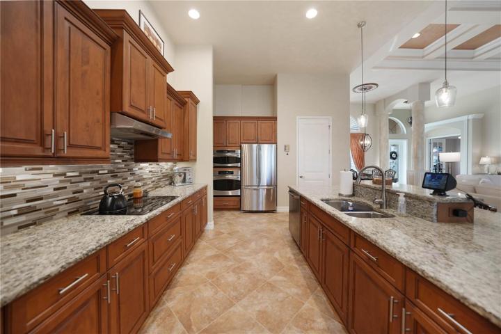 Kitchen with S/S Appliances, Granite Countertops, Wood Cabinets with soft close feature