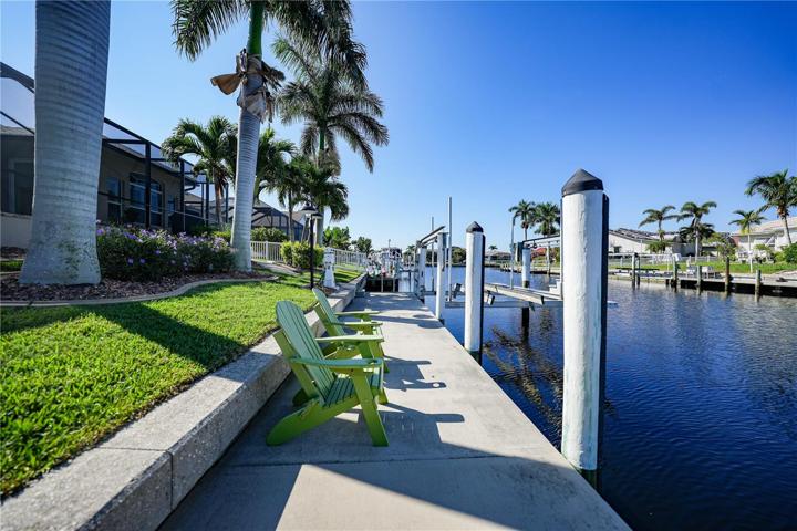 83Foot Seawall with 45 Ft Dock with Electric and Water. 10,000# boat lift