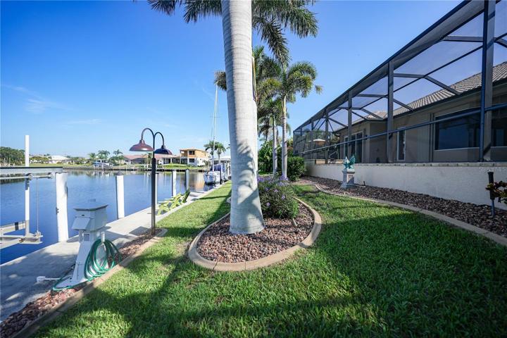83Foot Seawall with 45 Ft Dock with Electric and Water. 10,000# boat lift