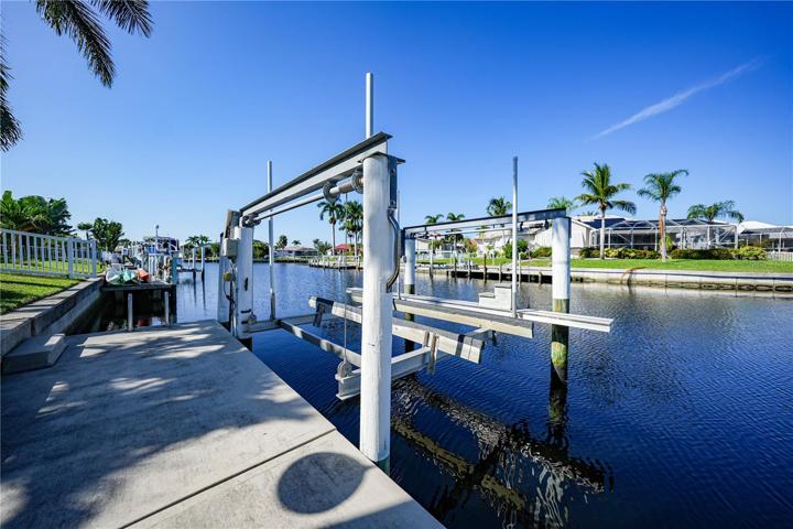 83Foot Seawall with 45 Ft Dock with Electric and Water. 10,000# boat lift