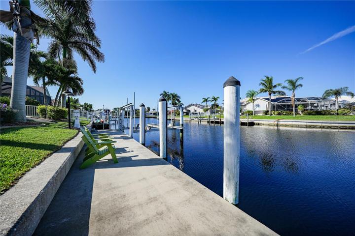 83Foot Seawall with 45 Ft Dock with Electric and Water. 10,000# boat lift