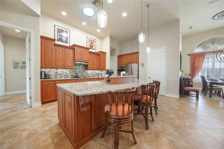Kitchen with S/S Appliances, Granite Countertops, Wood Cabinets with soft close feature