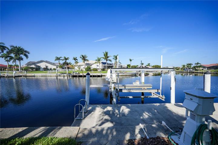 83Foot Seawall with 45 Ft Dock with Electric and Water. 10,000# boat lift