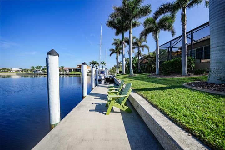 83Foot Seawall with 45 Ft Dock with Electric and Water. 10,000# boat lift