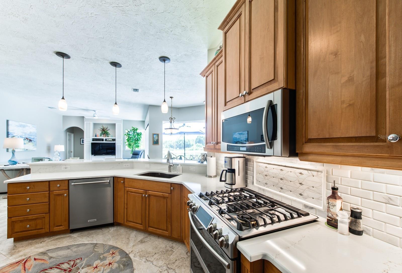 You'll be inspired to create culinary masterpieces in the spacious updated kitchen.