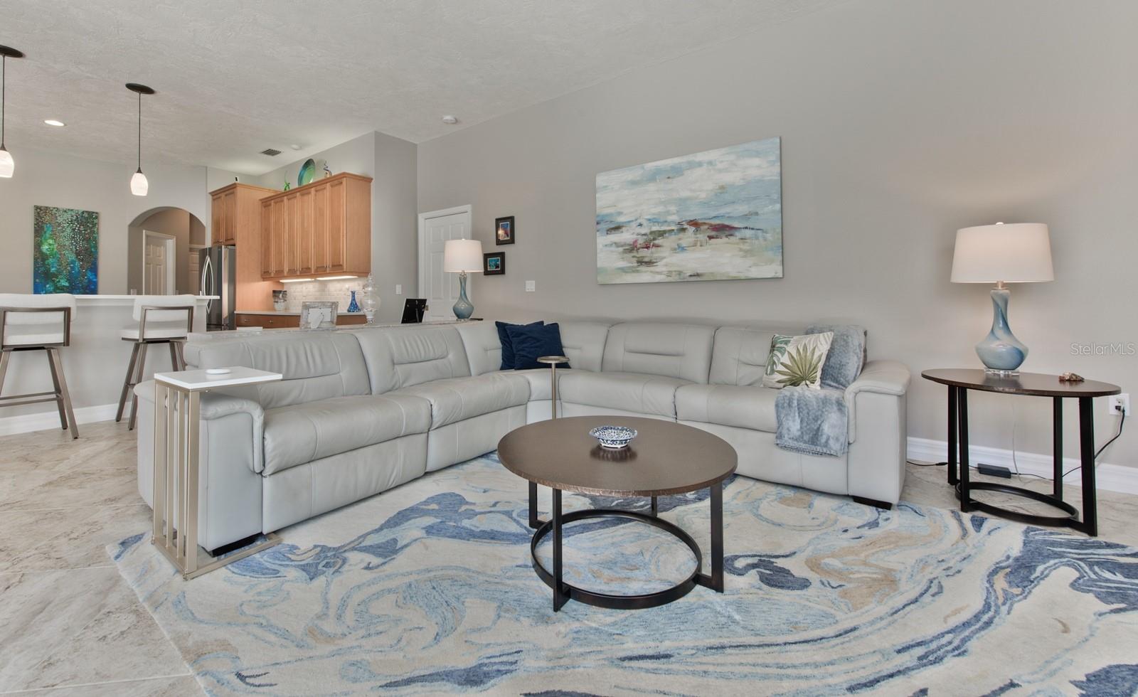 Entertaining is a breeze in this well planned open and airy floor plan.