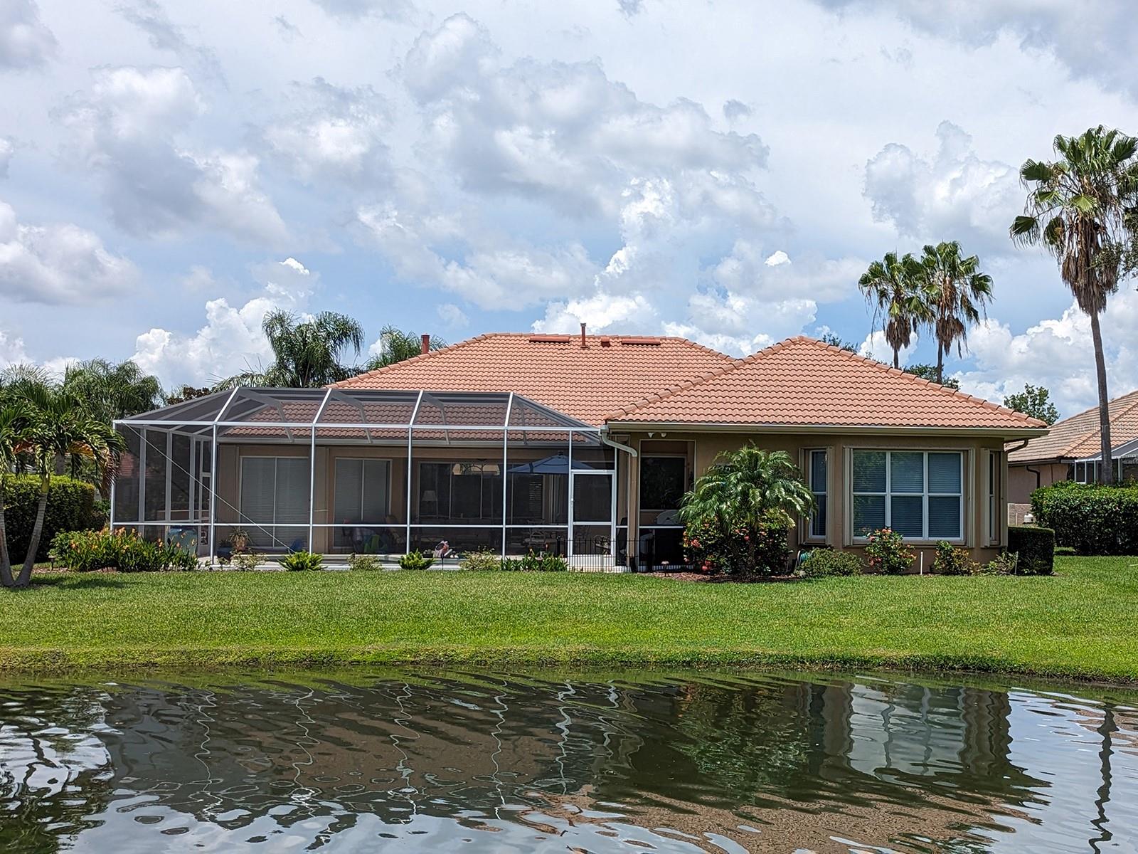 Looking back at your new home from across the lake. A brand new 4 ton Trane A/C was just installed for the main part of the home. The owner's suite has a 2 ton Trane A/C that's less than 2 years old. Programmable Nest thermostats can be controlled from an app on your phone.