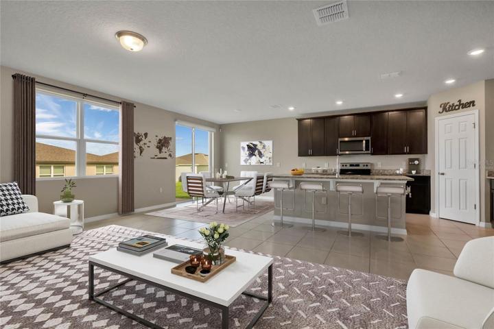 The living room is open to the kitchen! Virtually Staged.