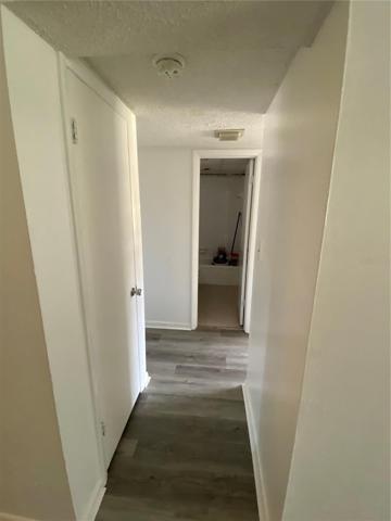 Hall to bedrooms and bathroom