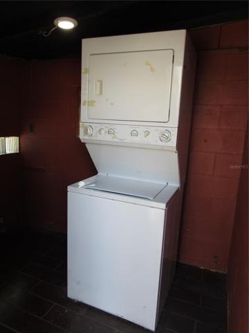Laundry room with Stack washer/dryer.