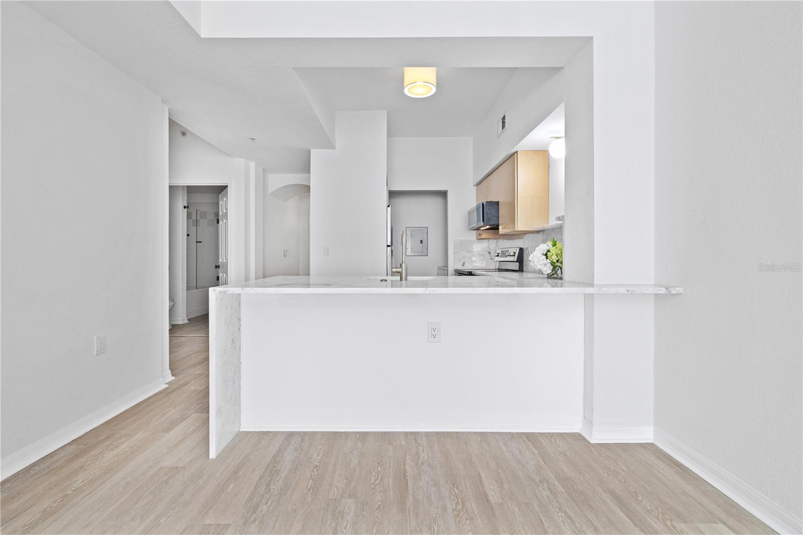Opening the kitchen allows natural light to fill the space