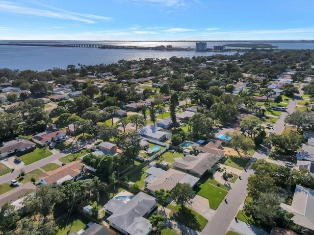 Discover a splendid poolside residence conveniently located just moments away from gorgeous beaches, Tampa, downtown St. Petersburg, schools, shopping, and excellent dining options.