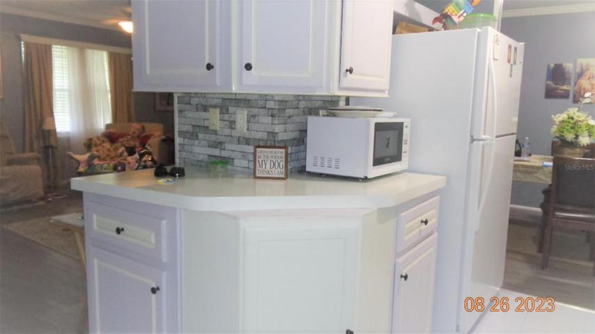 New refrigerator, more cabinets open floor plan