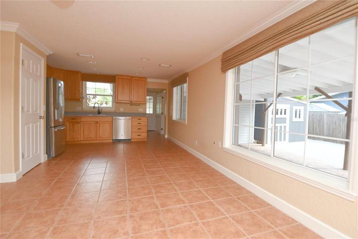 The kitchen has plenty of space for a breakfast table and a floating island.