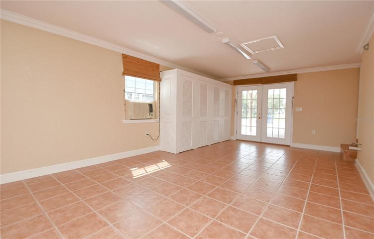 Additional closet space and shelving in this versatile room.