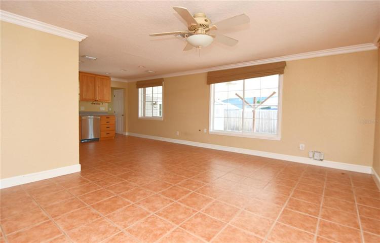 The great room seamlessly opens to the kitchen.