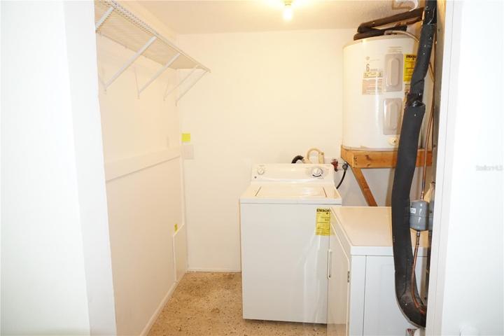 Unit A Bedroom 1 closet and laundry