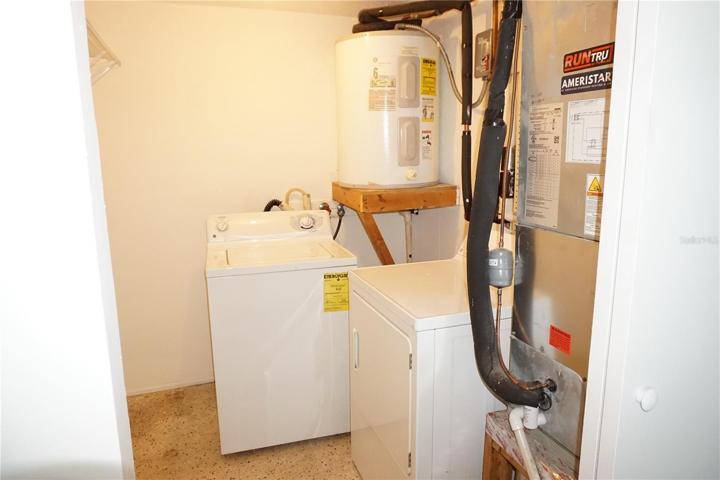 Unit A Bedroom 1 closet and laundry