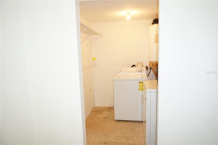 Unit A Bedroom 1 closet and laundry