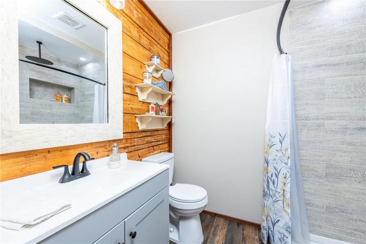 Master bathroom was completely remodeled with new vanity, toilet, shower, mirror, fixtures and flooring