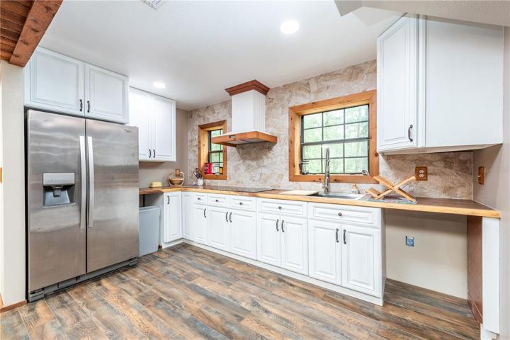 Completely remodeled kitchen with brand new cabinets, countertops, stainless steel appliances.