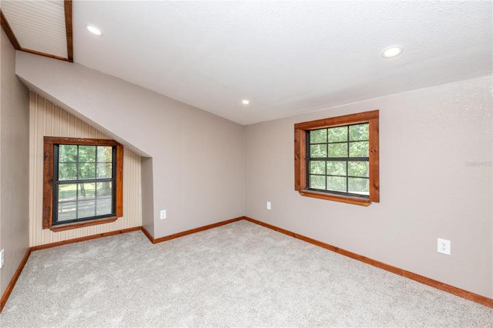 Bedroom 3 with all new carpet is upstairs